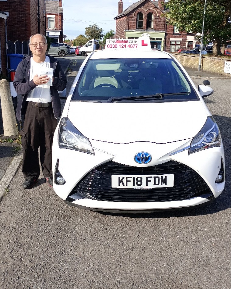 driving test pass photo of Tat Koon